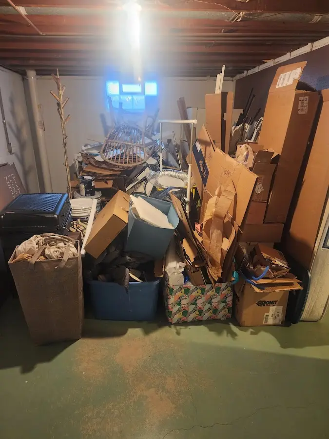 Roll-off dumpster container at job site for 20 Yard Dumpster Rental in Liberty